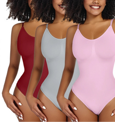 Three models wearing smoothing shapewear bodysuits in red, gray, and pink colors, from the front.